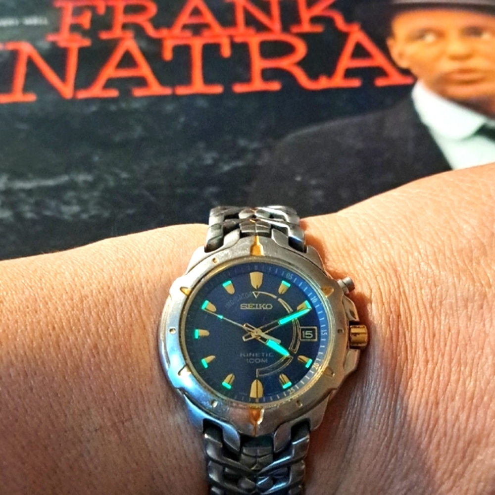 Seiko Silver and Gold Watch with Metal Bracelet and Elegant Design